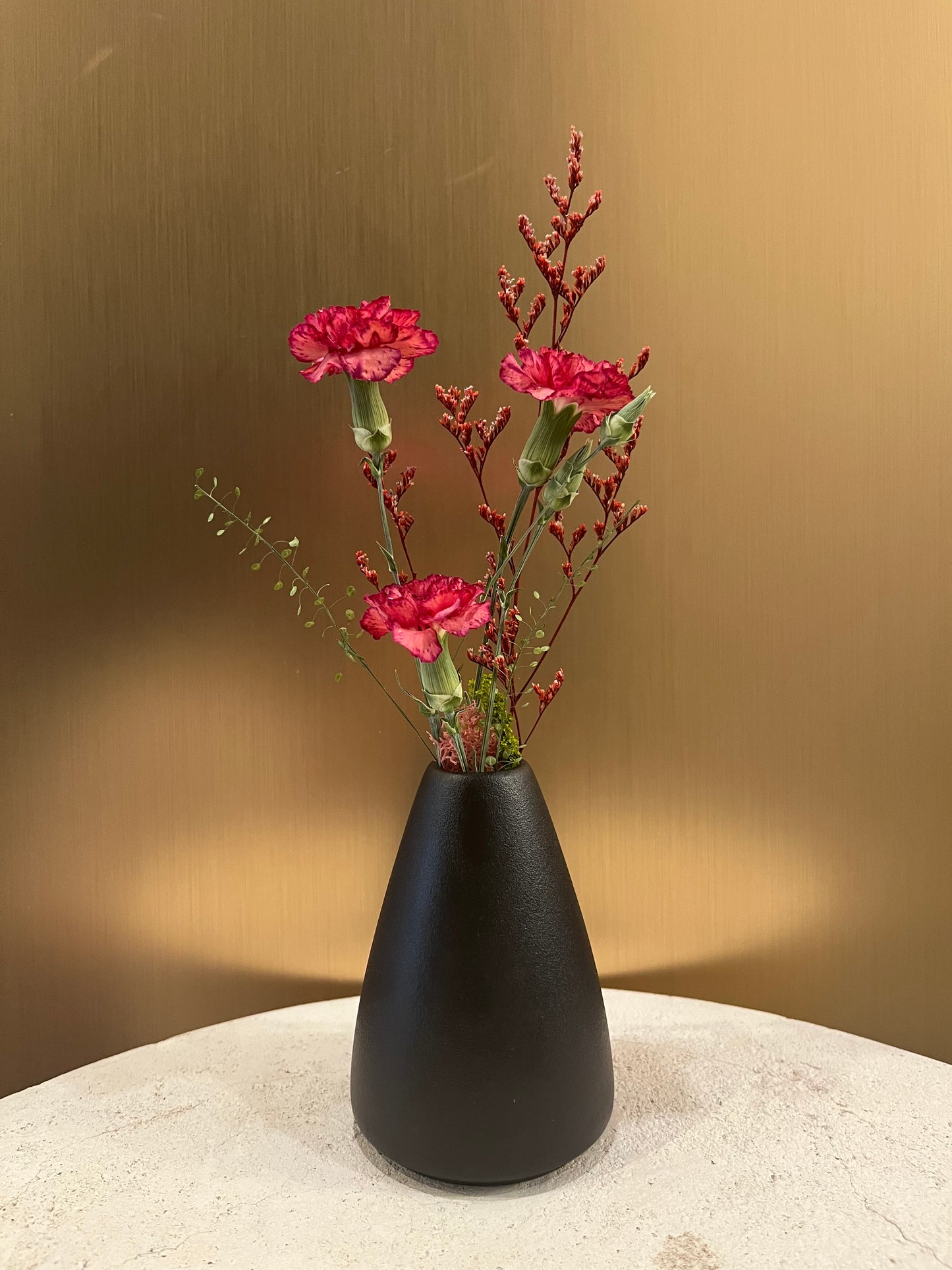 Preserved carnation in a vase
